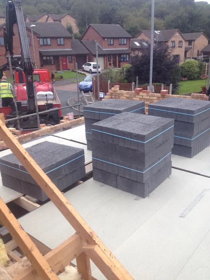 a group of boxes sitting on top of a cement slab